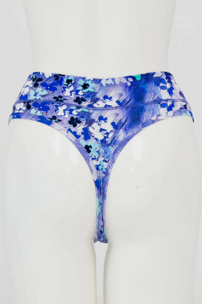 Back view of high rise thong underwear showing thong design and blue floral pattern