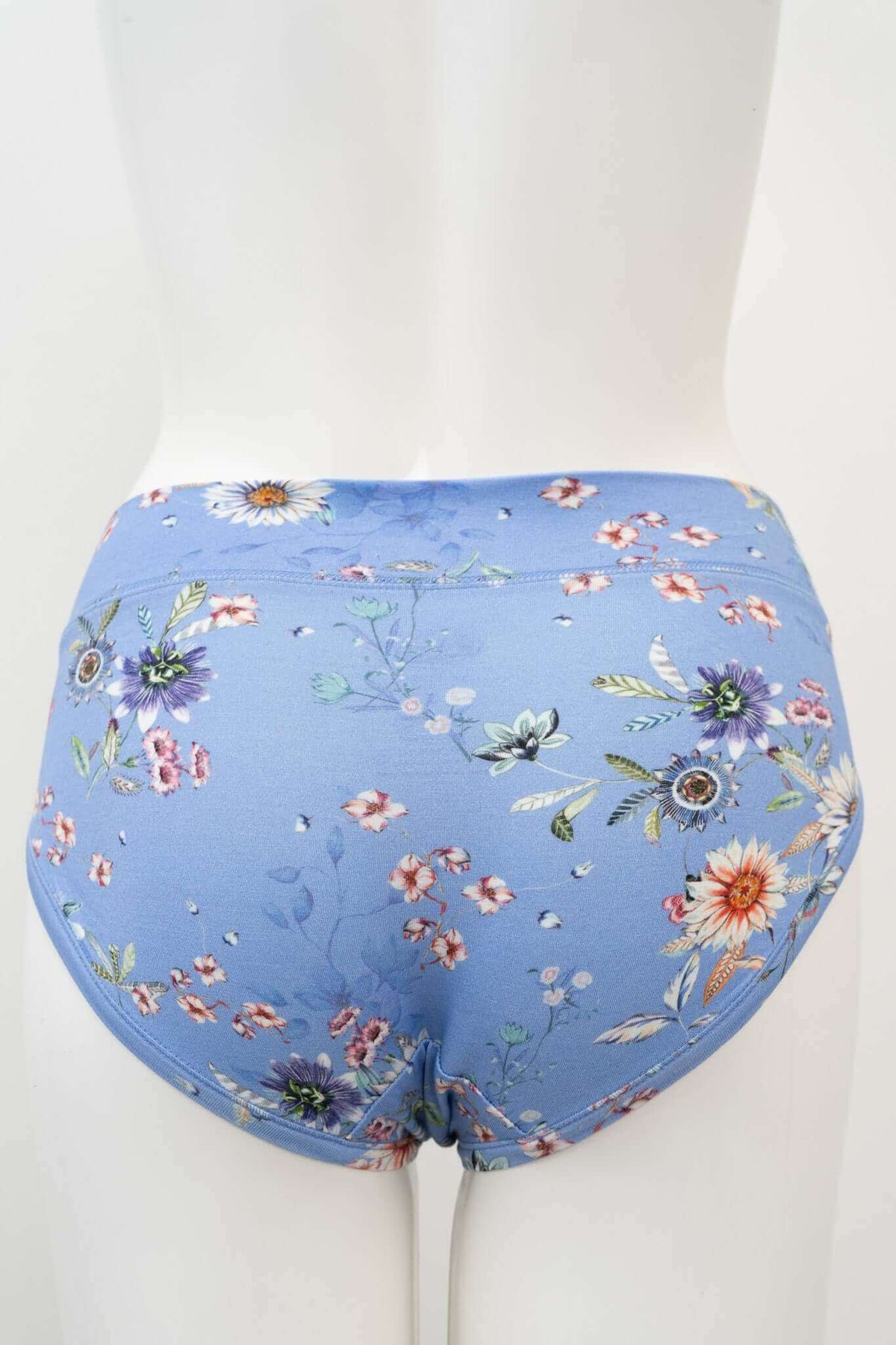 Back view of blue floral hipster underwear on a mannequin