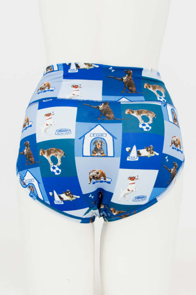 Back view of blue high-waisted brief with allover dog park and dog house pattern