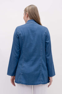 Back view of woman wearing a blue hip-length collared jacket