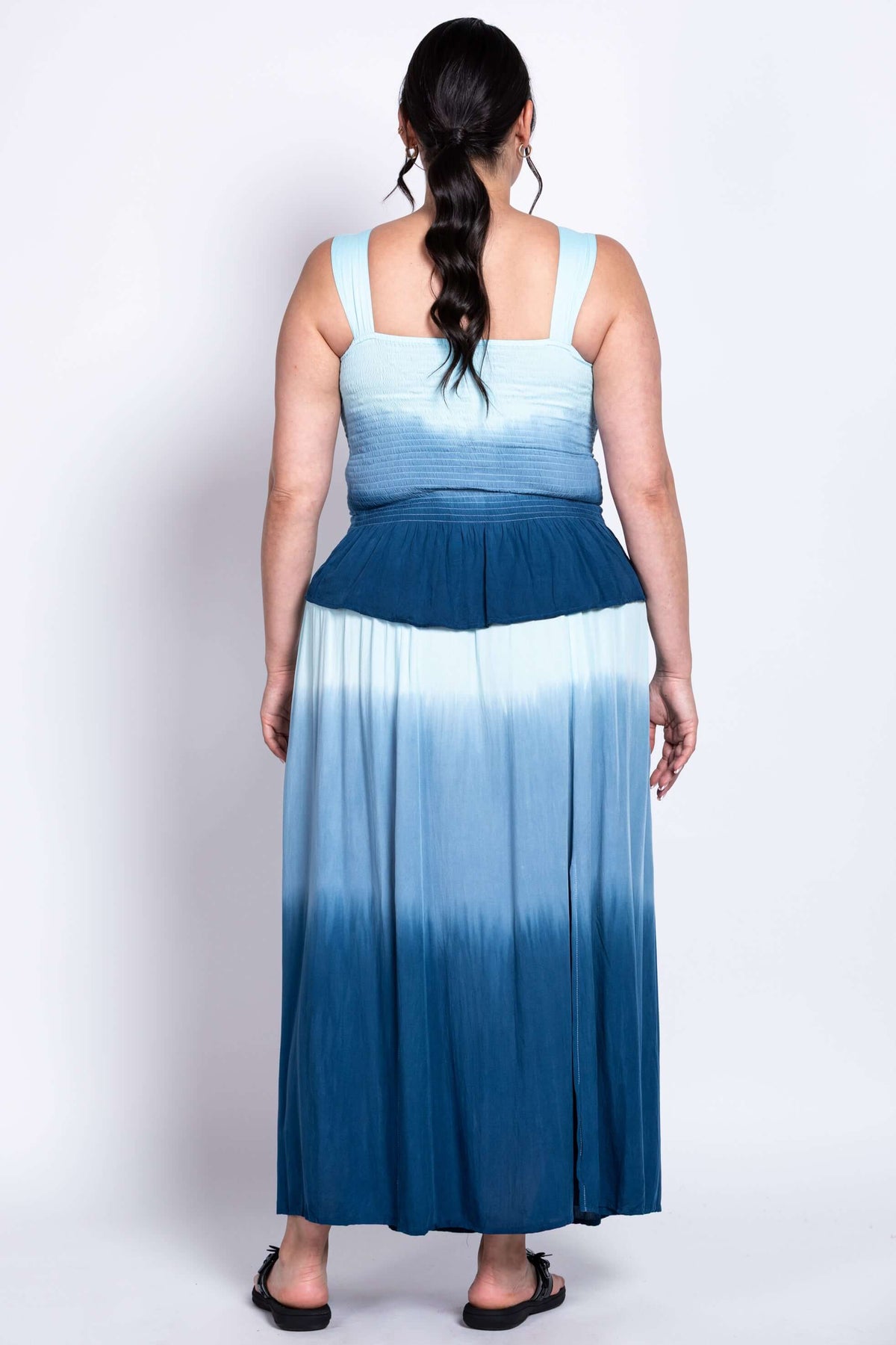 Back view of blue ombre maxi dress showing elastic detail