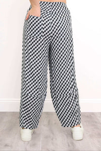 Back view of boardwalk pants highlighting patch pockets and wide cropped leg