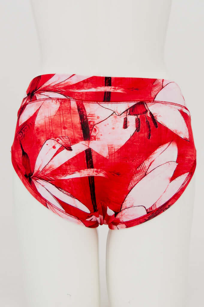 Back view of red hipster brief underwear featuring white feather artwork