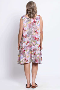 Back view of Gia Dress highlighting ruffle detail and all-over floral print