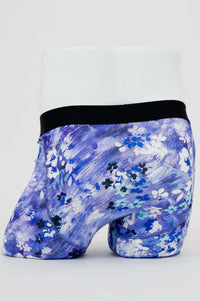 Back view of blue and white floral bamboo boxer briefs showing seamless floral design and waistband