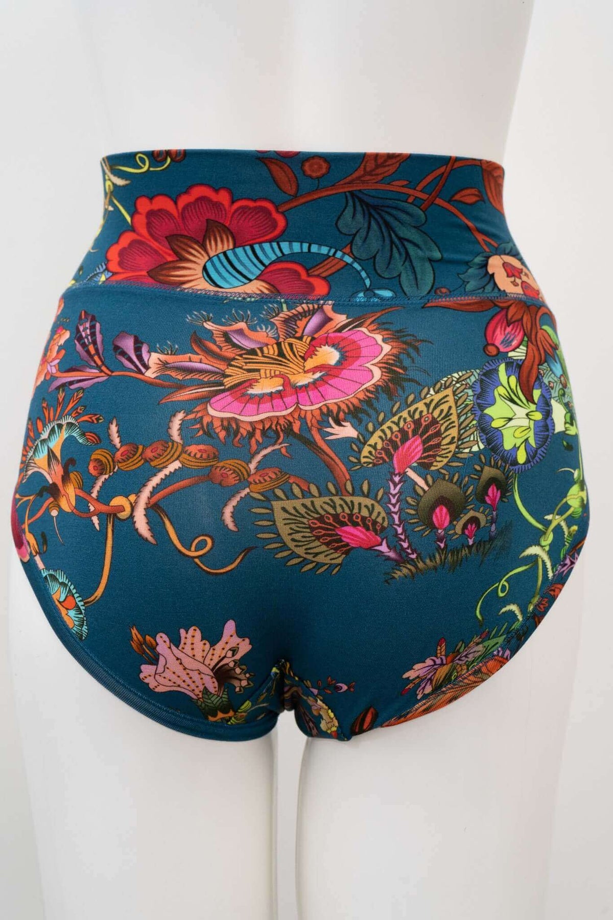 Back view of high-waist brief featuring detailed botanical design