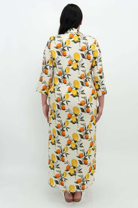 Back view of woman wearing linen bamboo citrus maxi shirt dress
