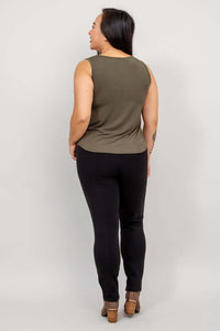 Back view of model wearing olive green Ritzy tank top and black pants