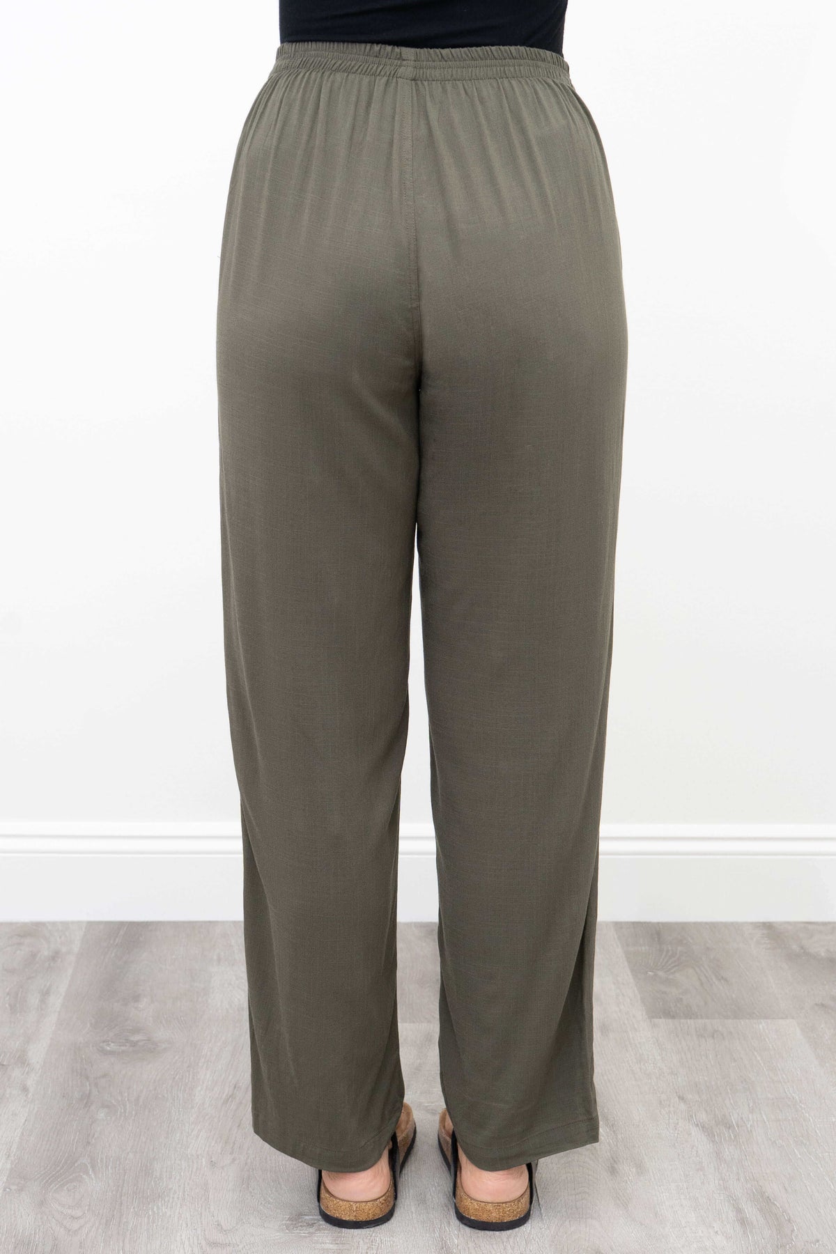 Back view of olive bamboo linen pants with elastic waistband