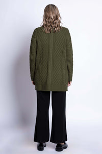 Back view of woman showing textured design of olive green cable knit cardigan
