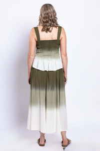 Back view of olive ombre sleeveless tank top and matching skirt worn by a woman