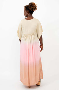 Back view of ombre tiered maxi dress showing gentle pleats and gradient color