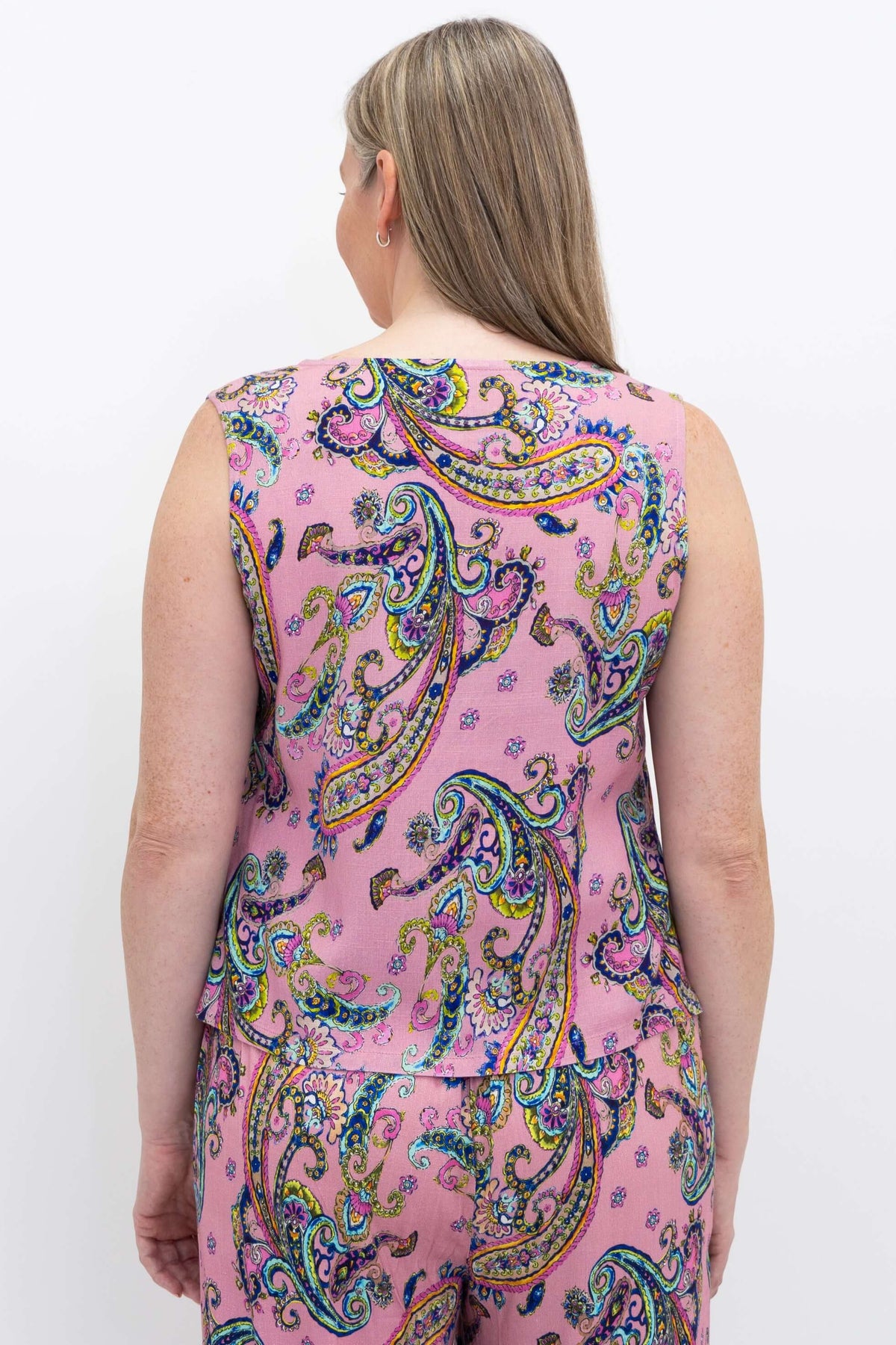 Back view of woman showing pink paisley cropped tank top details