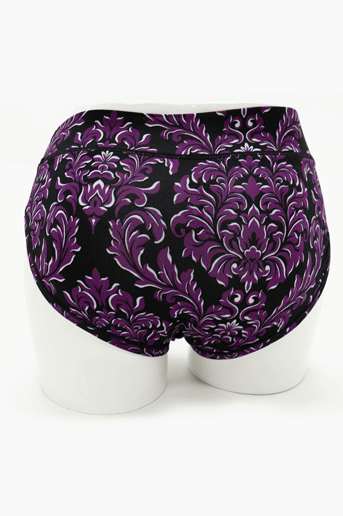 Back view of purple and black flourish print hipster underwear on mannequin