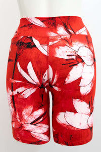 Back view of red floral Hallie Bamboo Shorts with white lilies and wide waistband