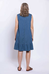 Rear view of sleeveless blue dress with ruffle hem and straight seam