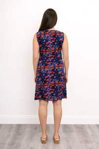 Back view of woman in navy floral sleeveless dress