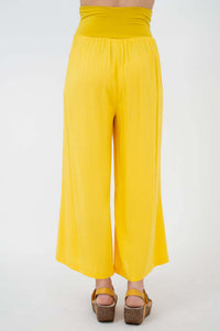 Back view of yellow wide-leg capri pants with high waistband