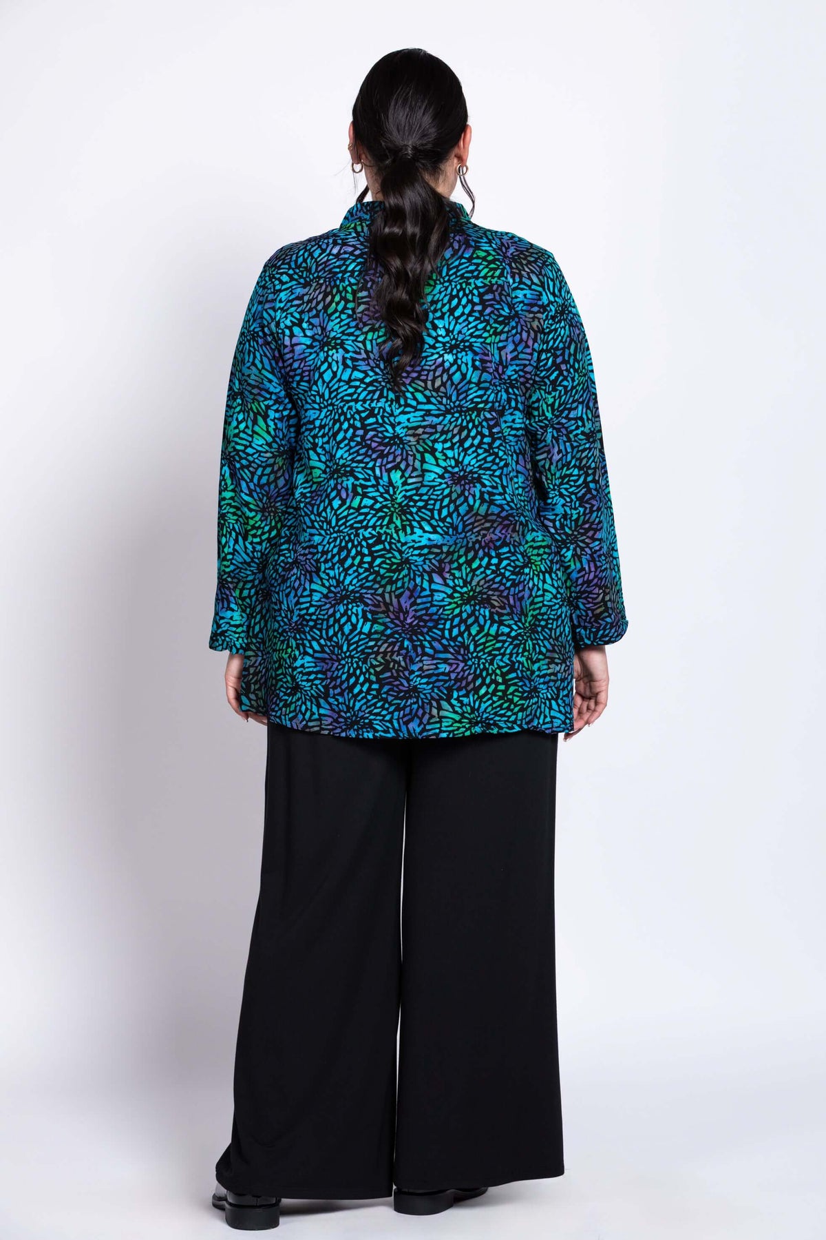 Back view of Shirley Blouse highlighting the vibrant print and relaxed fit