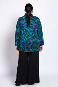Back view of Shirley Blouse highlighting the vibrant print and relaxed fit