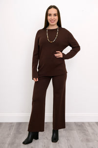 Women's casual deep cocoa lounge trousers worn as a matching set on a model standing against a white backdrop.