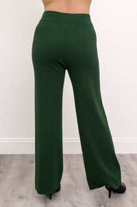 Back view of deep sage green straight-leg pants, showcasing a flattering smooth rear drape and comfortable fit.