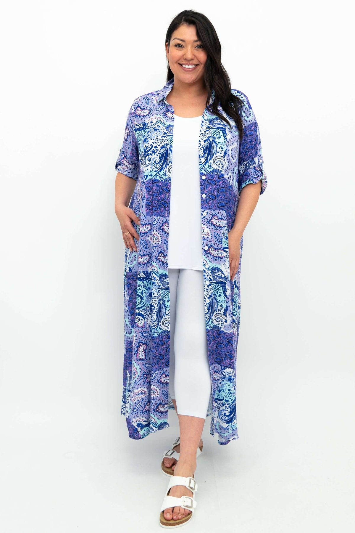 Model styling bamboo linen maxi shirt dress open as a duster with white pants