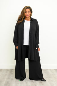 Close-up front view of a black bamboo French terry tunic featuring a tailored shirt-style collar and paneled waist.