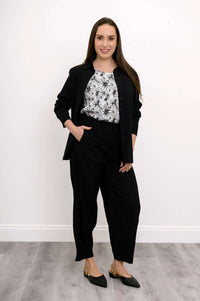 Black Boardwalk Pants styled with a monochrome floral blouse and black jacket