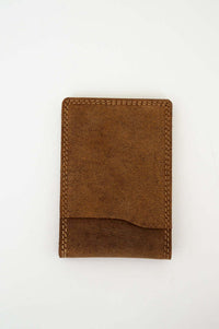 Front view of a brown buffalo leather slim wallet on a white background
