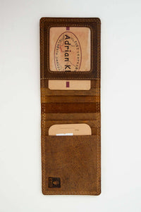 Open brown buffalo leather wallet showing multiple card slots and ID window