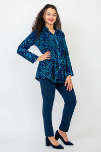 Side angle of model in Cindy shirt, hand on hip, showing detailed pattern