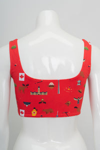 Back view of a red unlined bra with wide straps and canadian images