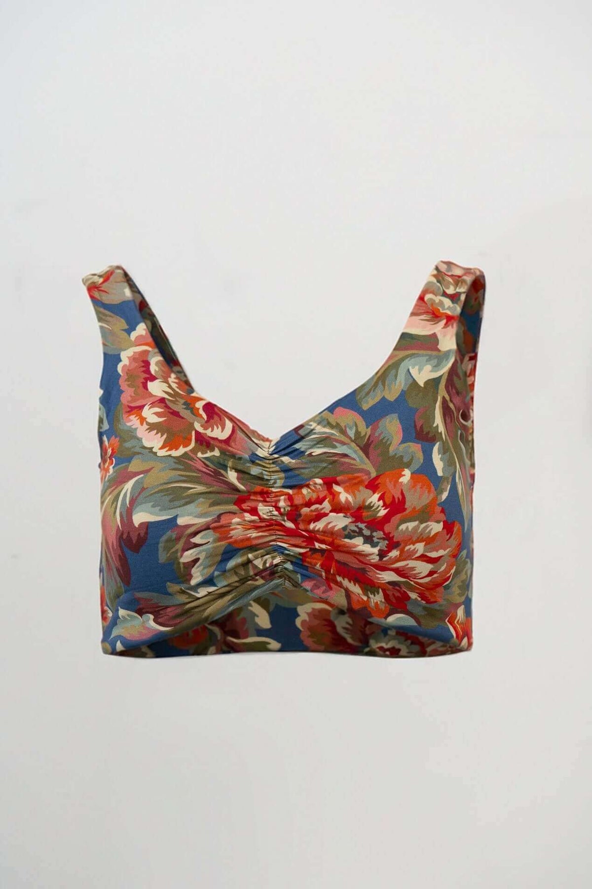 Clipper Top with colorful floral print, wide straps, and cinched V-neck design