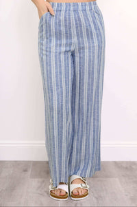 Parker Pant, blue striped, close-up front detail with hands in pockets