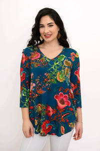 Close-up front of Jackie V Neck teal bamboo top with vivid multicolor floral design