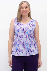 Close-up of model wearing a purple watercolor V-neck tank top