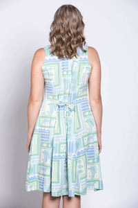 Detail of the tie-back feature on the rear of the light geometric print dress