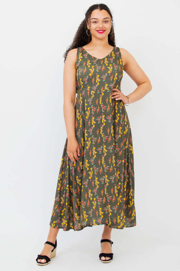Front view of woman wearing Coraline empire waist maxi dress with floral print