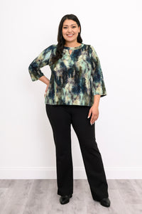 Full-body shot of a patterned green knit top with 3/4 bell sleeves and black trousers, showing the hip-length hem.