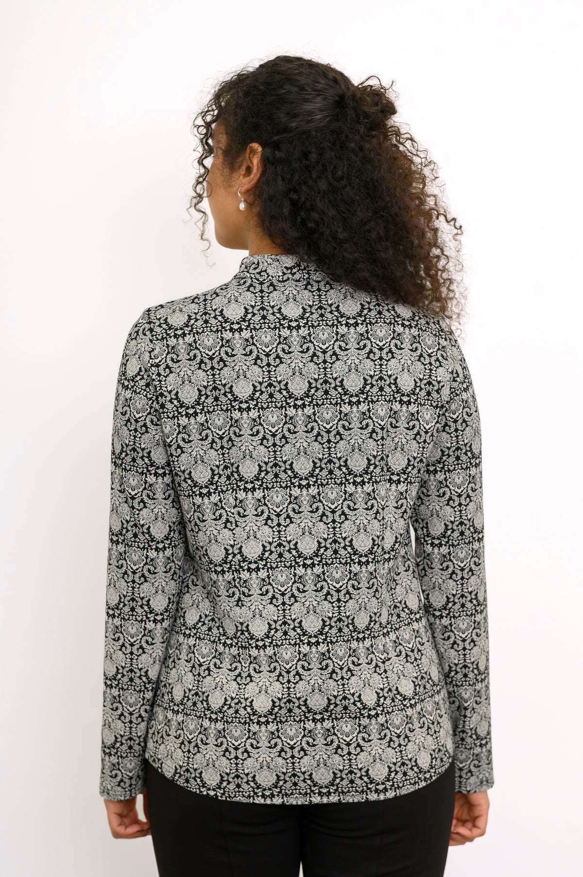 Back view of a grey floral bamboo shirt showing the clean paneled structure across the shoulders and waist