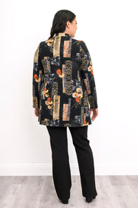 Rear view of a gold and black patterned long sleeve blouse highlighting the smooth, comfortable back fit.