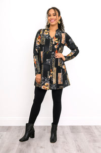 Front shot of a black and orange floral bamboo tunic top with a center-front pleat for a flattering drape.