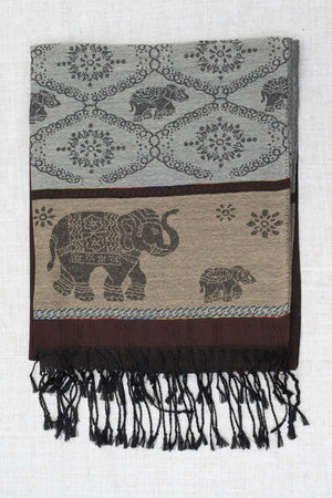 Folded pashmina scarf with intricate elephant and floral designs in grey, brown, and beige tones