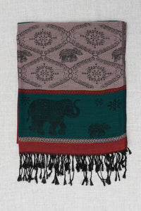 Unfolded pashmina scarf displaying elephant and floral motifs with black fringe