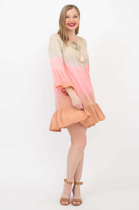 Side-front view of Ellie Dress on model showing flared hem and sleeve detail