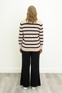 Back view of a beige and black striped cotton sweater, showcasing a clean back panel and straight, ribbed hem.