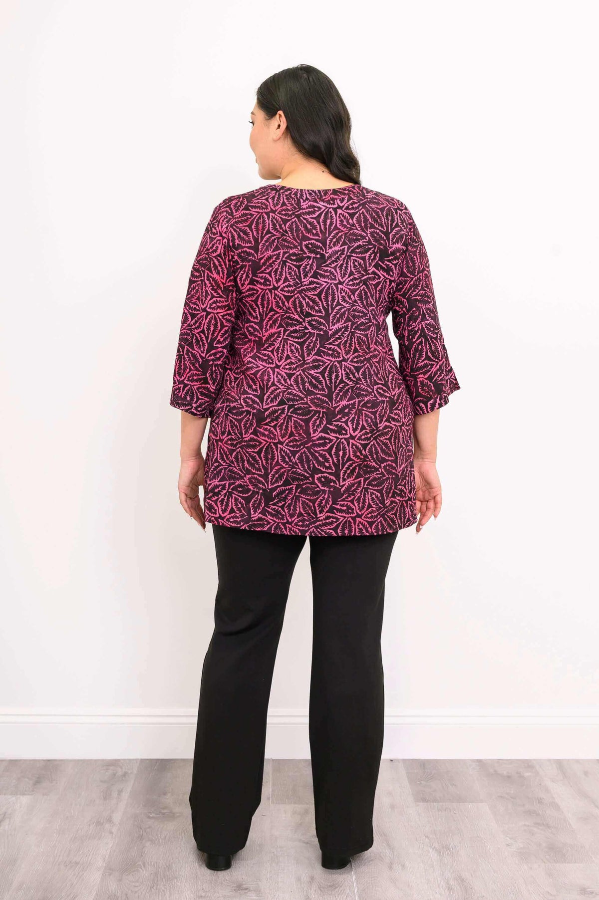 Back view of Evelyn Top, showing full leaf print pattern and relaxed fit