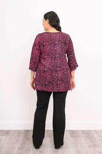 Back view of Evelyn Top, showing full leaf print pattern and relaxed fit