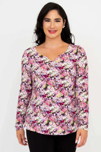 Front view of woman wearing floral sweetheart neckline long sleeve bamboo top